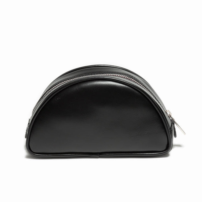 Back view of The Valentina Toiletry in black leather with clean minimalist lines and refined contemporary Italian construction.